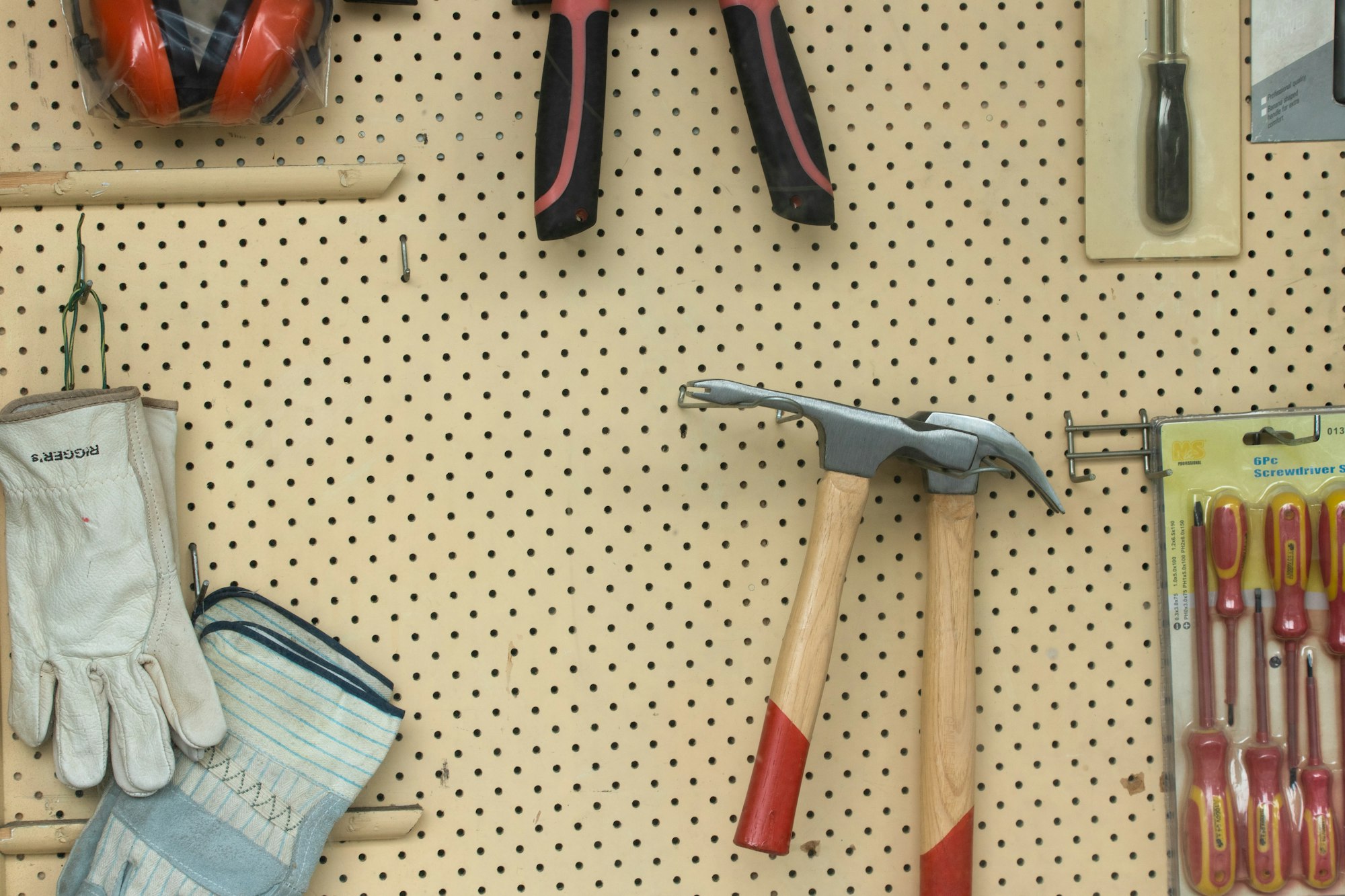 Wall of hand tools on display