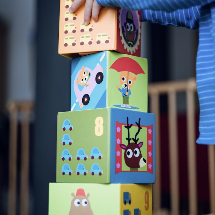 Child engaged in learning activities at Nellie's Daycare Galgorm