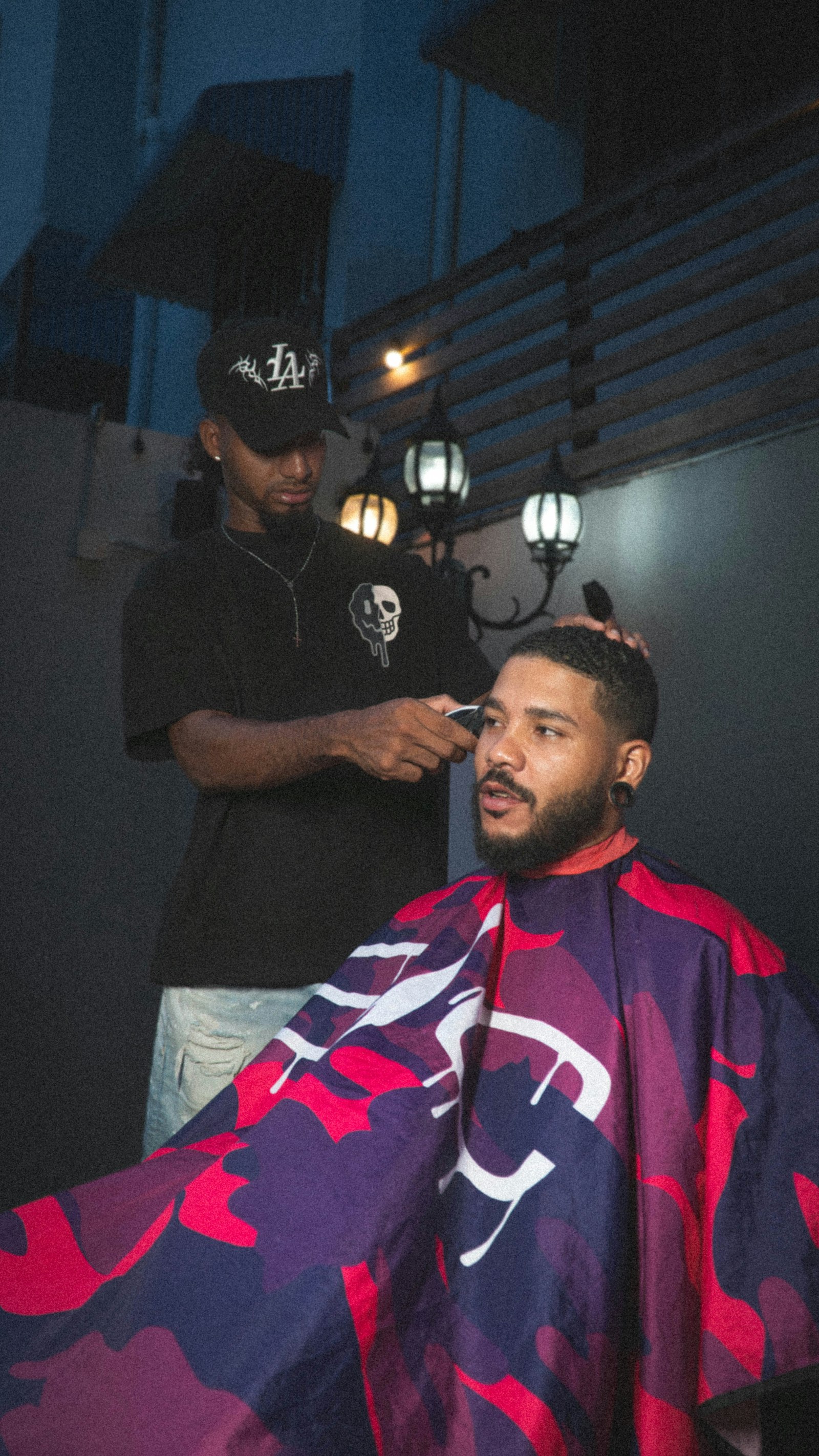 Stylist finishing a haircut at Salon 101