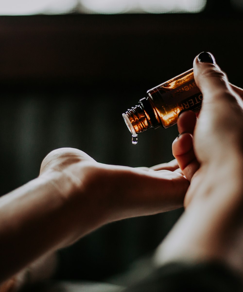 Aromatherapy oil being applied during a holistic treatment