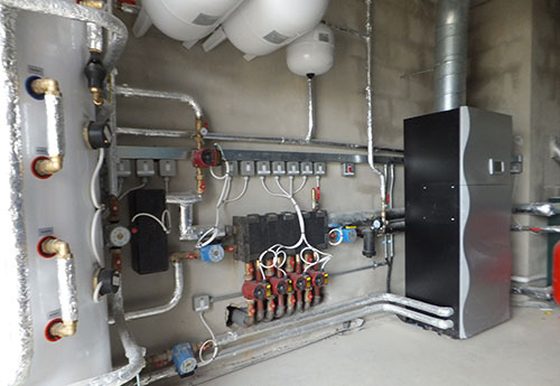 Orca air-to-water heat pump plant room installation by Sweeney Renewables