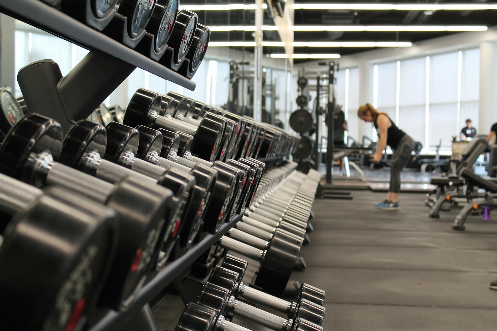 Free weights and dumbbell rack inside Transform Fitness Hub